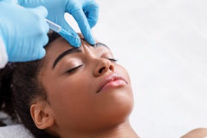 young woman receiving botox therapy